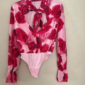 Beautiful Floral Top with deep v-neck!